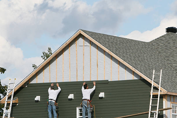 Professional Siding technician working in Long Beach, MD